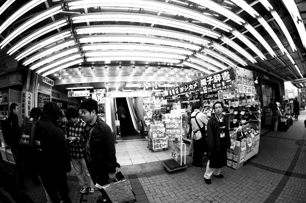 Tokyo, Japan - October 29, 2010: Vendors and shoppers in the busy Akihabara district of Tokyo, famous for the commerce in electronics