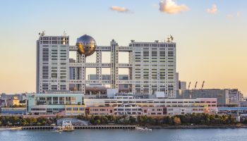 Tokyo, Japan- December 26,2015: Fuji TV Building headquarters at sunset in Odaiba
