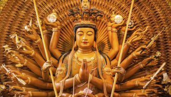 Kannon is the Buddhist Goddess of Mercy. You'll spot incarnations of this many-armed goddess throughout Japan.